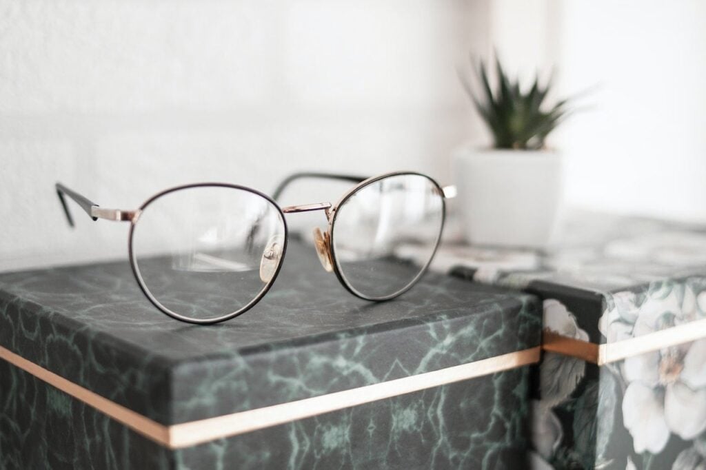 Focused shot of eyeglasses on top of a box