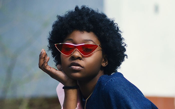 Examples of people with round faces wearing sunglasses