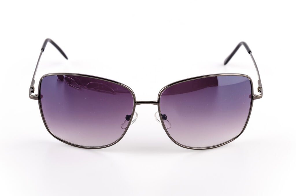 Gradient sunglasses on a white studio background