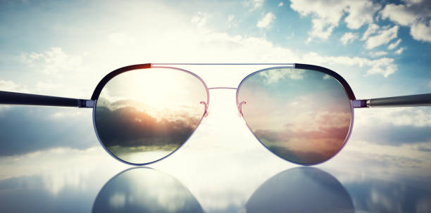 Polarized sunglasses on a sunny sky background