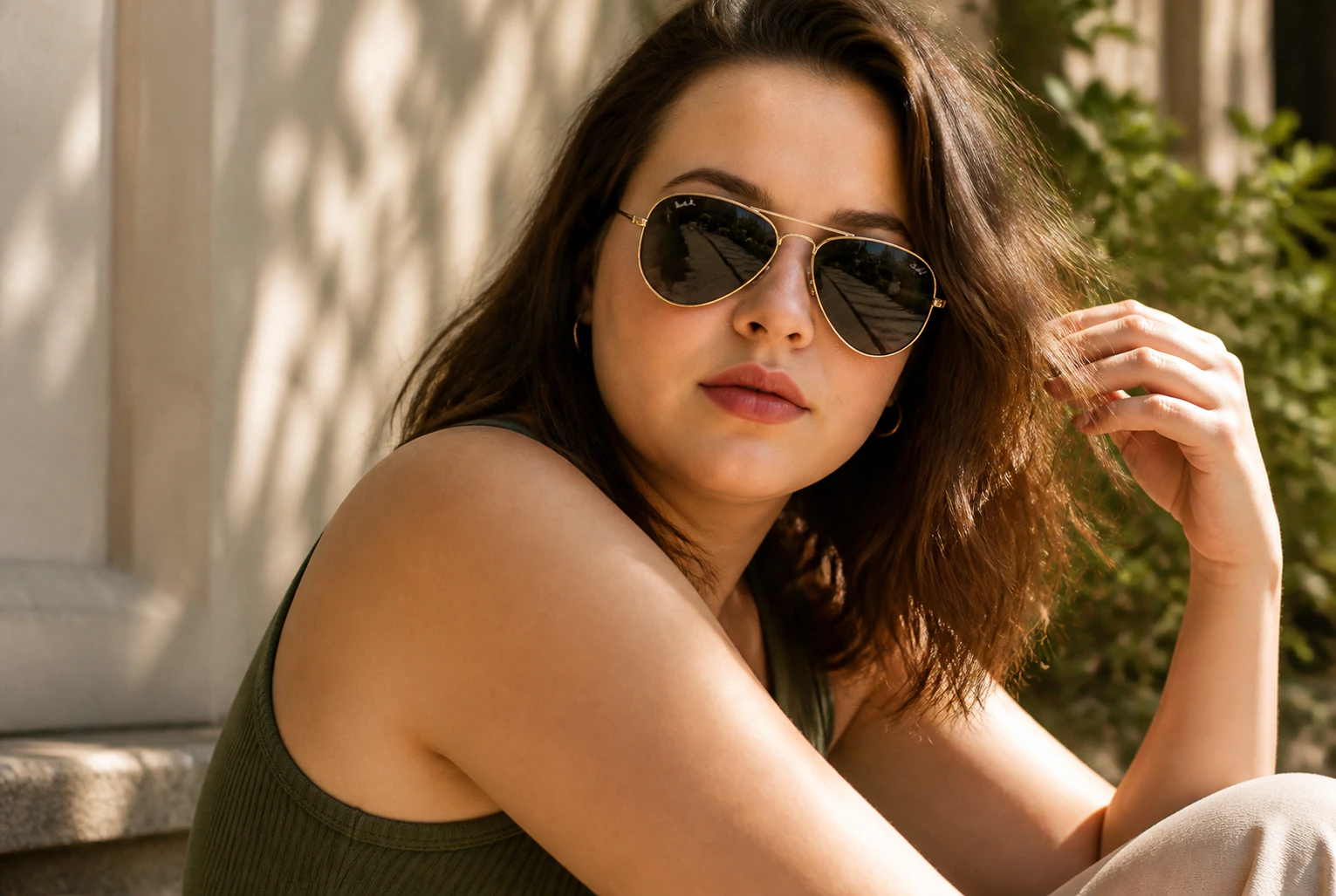 Examples of people with round faces wearing sunglasses