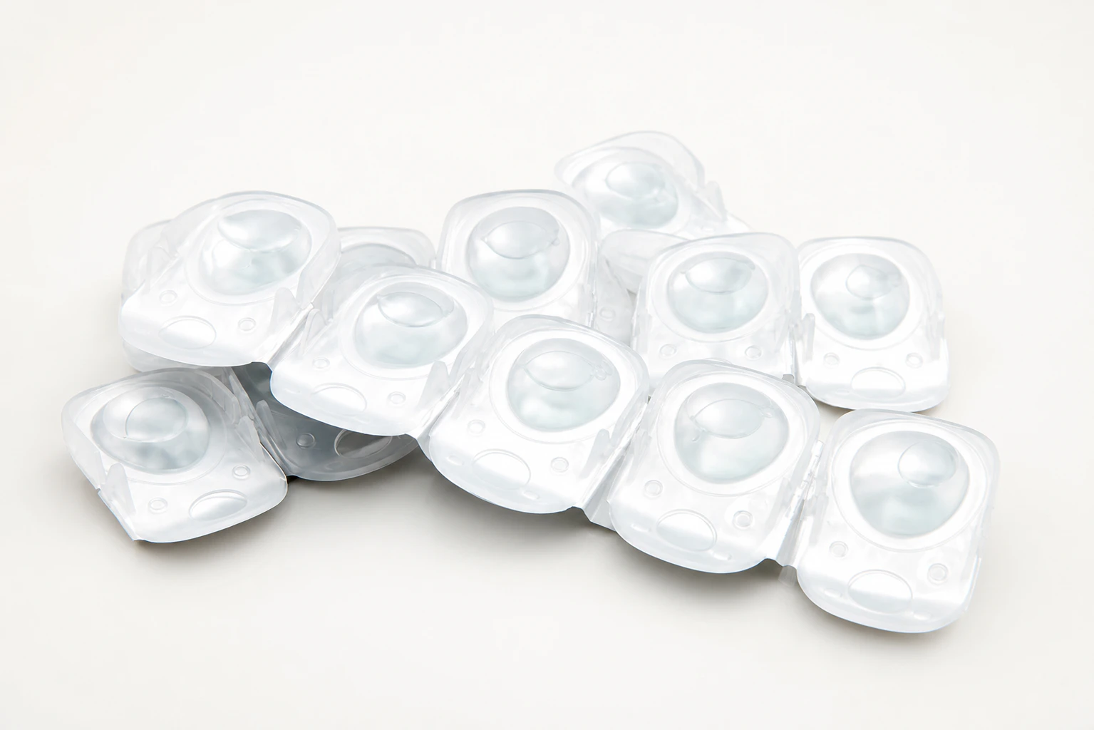 stack of disposal contact lense isolated on white