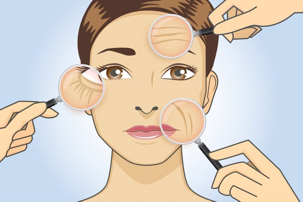 How to Get Rid of Eye Wrinkles 2 Woman magnifying wrinkle on face