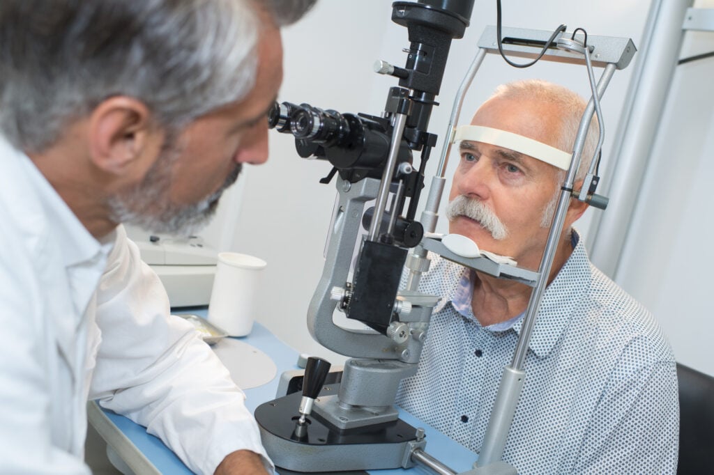 A Guide to Vision Care Services for Veterans 2 Elderly man with glaucoma at the optician for optical exam